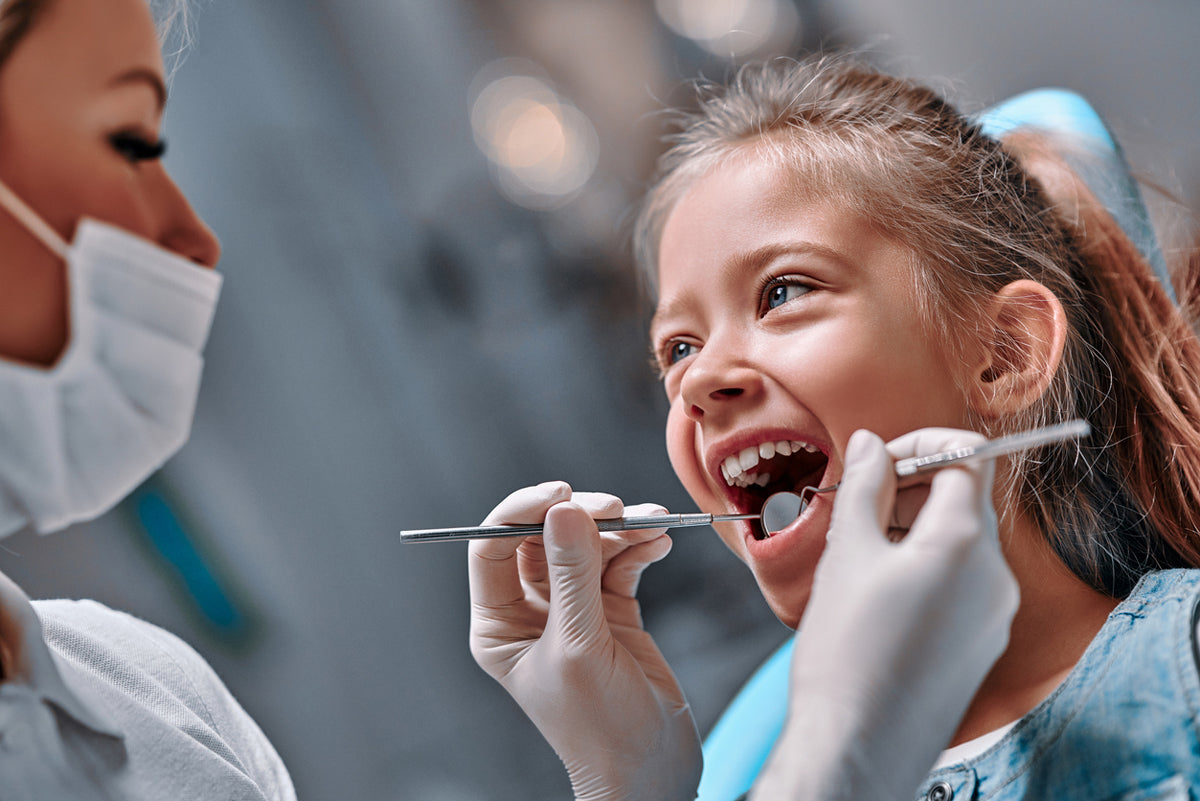 Signs Your Child Needs White Fillings for Their Teeth